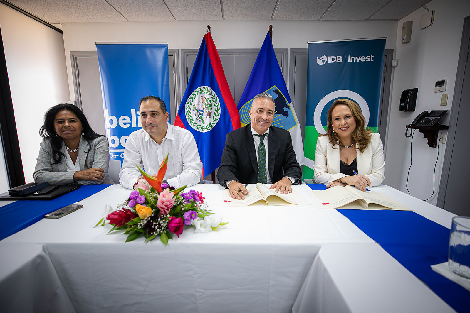 Four professionals sitting on table